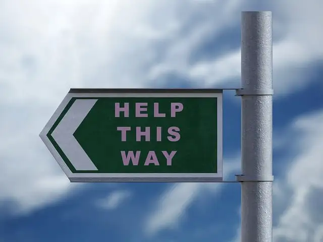 A sign that says "help this way". Guides and tutorials.Create guides that solve common problems or provide valuable information for your local audience.