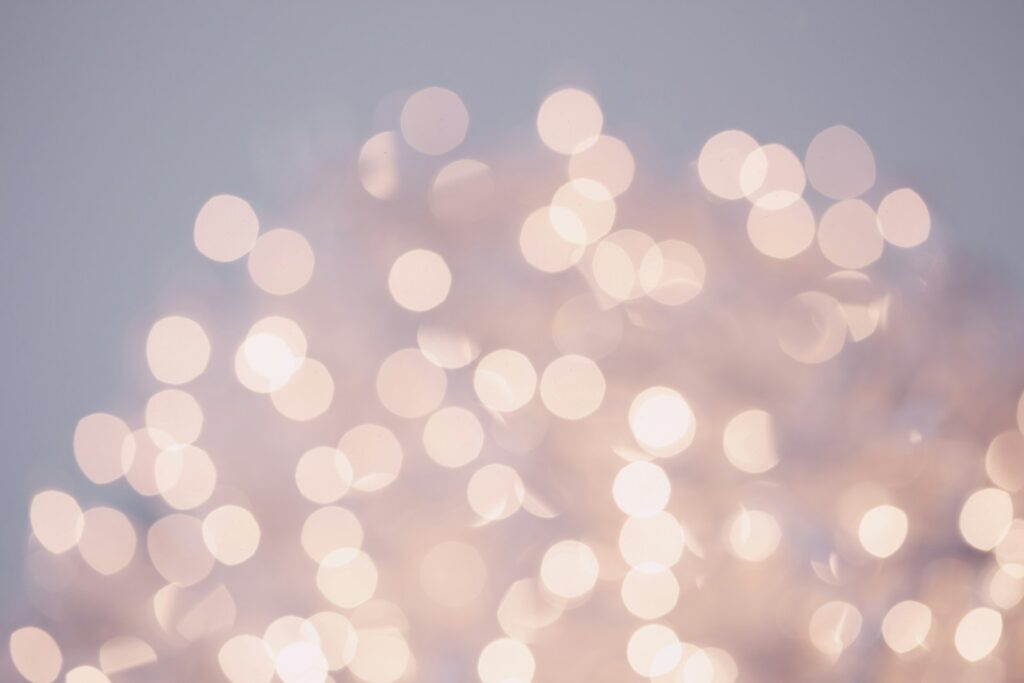 A photograph of a subtle pink bokeh pattern. Keep it subtle. Micro-interactions should enhance the user experience without overwhelming the main content.